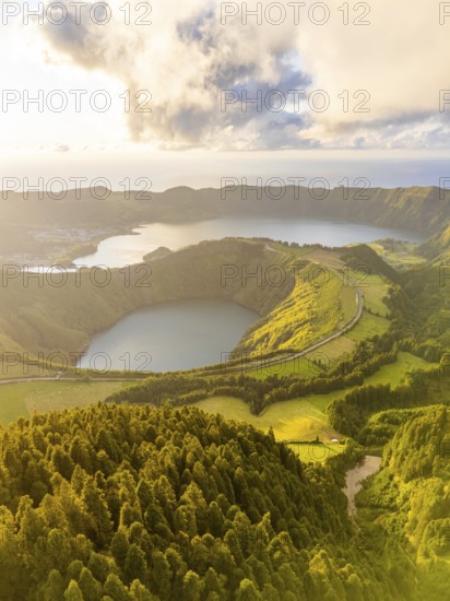 Sete Cidades Massif on Sunny Evening. Blue Lake and Santiago Lake. Forest and Hills with Pasturelands. Azores, Sao Miguel Island. Portugal. Aerial View