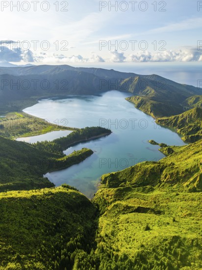 Lagoa do Fogo Crater Lake at Sunrise. Green Lush Hills and Mountains. Azores, Sao Miguel Island. Portugal. Aerial View
