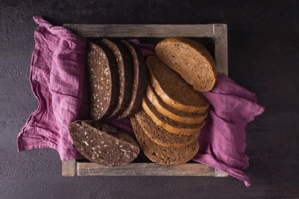 Healthy bread with seeds in a wooden box