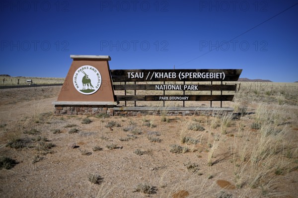 Sign at the entrance to Tsau//Khaeb National Park, diamond restricted area, near Aus, Karas Region, Namibia