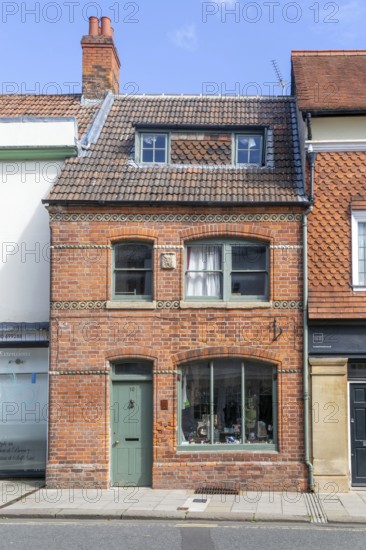 Historic listed building 10 St John's Street, Devizes, Wiltshire, England, UK - Shop premises, circa 1860s or 1870s remodelling of earlier building