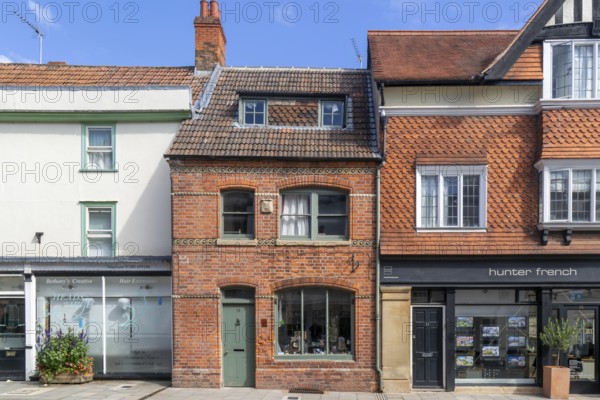Historic listed building 10 St John's Street, Devizes, Wiltshire, England, UK - Shop premises, circa 1860s or 1870s remodelling of earlier building