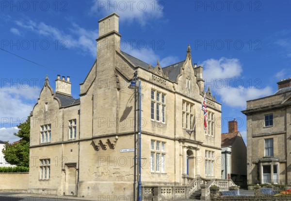 Listed mid nineteenth century historic building, 15 High Street, junction with St John's Street, Devizes, Wiltshire, England, UK built of Bath stone