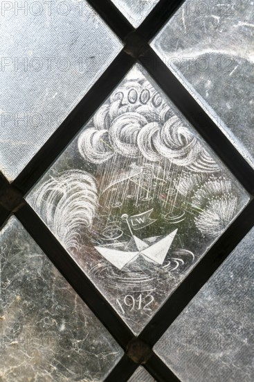 Glass engraved memorial panes, St Mary's church, Alton Barnes, Wiltshire, England, UK designed by Laurence and Simon Whistler