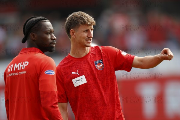 Football, 1st Bundesliga, Matchday 3, 2025/2026, 1. FC Heidenheim vs. Borussia Dortmund, 13/09/2025, Voith-Arena, Heidenheim, Germany, Jan SCHÖPPNER 1. FC Heidenheim right and Omar TRAORE 1. FC Heidenheim