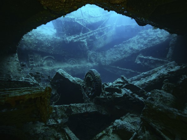 Red Sea, underwater, scuba, Egypt, wreck, Thistlegorm, sunk, world war, shipwreck, boat, ship, navy, transporter, blue, scrap, tyre, wheel, mystical, to the outside, from the inside, hold, cargo hold