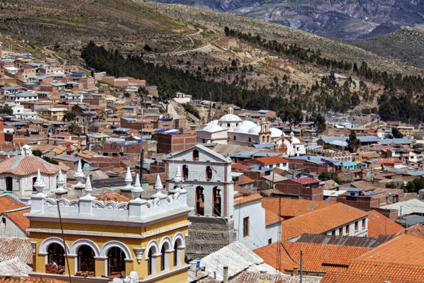 Building backdrop with historical charm, surrounded by mountainous landscape and nature, view over the city of Potosi in Bolivia
