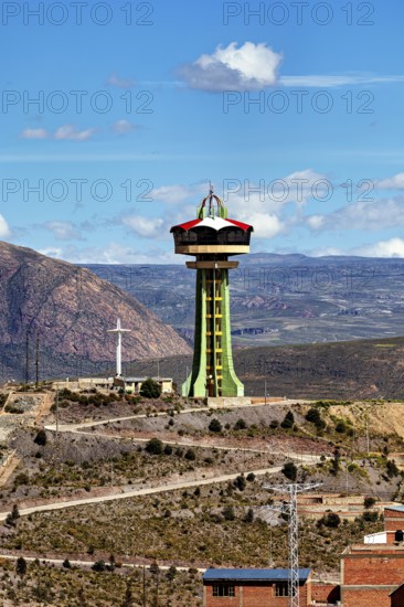 Large observation tower on a hill with sweeping views of the mountains and sky, the water tower of the city of Potosi in Bolivia