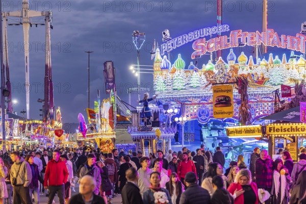 Folk festival time in Stuttgart. The 178th Cannstatter Volksfest on the Wasen is one of the most important traditional festivals in Germany. In addition to the large festival tents, the Wasen is characterised by fairground attractions. Around 320 showmen, festival hosts and market traders expect around four million visitors. Bad Cannstatt, Stuttgart, Baden-Württemberg, Germany