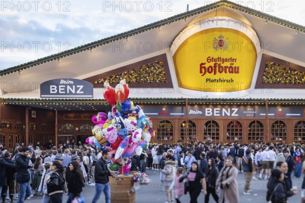 Folk festival time in Stuttgart. The 178th Cannstatter Volksfest on the Wasen is one of the most important traditional festivals in Germany. In addition to the large festival tents, the Wasen is characterised by fairground attractions. Around 320 showmen, festival hosts and market traders expect around four million visitors. Bad Cannstatt, Stuttgart, Baden-Württemberg, Germany
