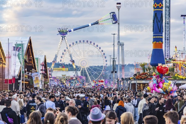 Folk festival time in Stuttgart. The 178th Cannstatter Volksfest on the Wasen is one of the most important traditional festivals in Germany. In addition to the large festival tents, the Wasen is characterised by fairground attractions. Around 320 showmen, festival hosts and market traders expect around four million visitors. Bad Cannstatt, Stuttgart, Baden-Württemberg, Germany