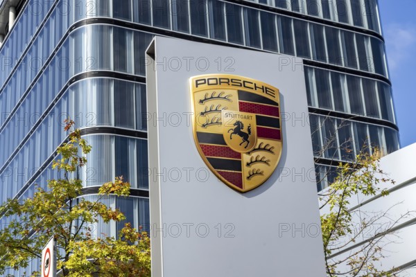 Porsche Centre Autohaus am Pragsattel. Porsche Design Tower skyscraper. Logo on a stele. Stuttgart, Baden-Württemberg, Germany