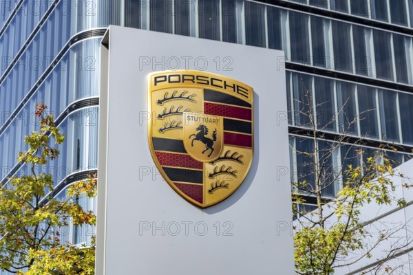 Porsche Centre Autohaus am Pragsattel. Porsche Design Tower skyscraper. Logo on a stele. Stuttgart, Baden-Württemberg, Germany