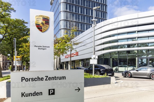 Porsche Centre Autohaus am Pragsattel. Porsche Design Tower skyscraper. Logo on a stele. Stuttgart, Baden-Württemberg, Germany