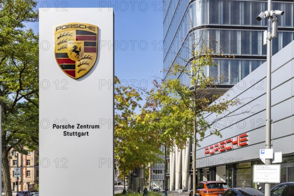 Porsche Centre Autohaus am Pragsattel. Porsche Design Tower skyscraper. Logo on a stele. Stuttgart, Baden-Württemberg, Germany