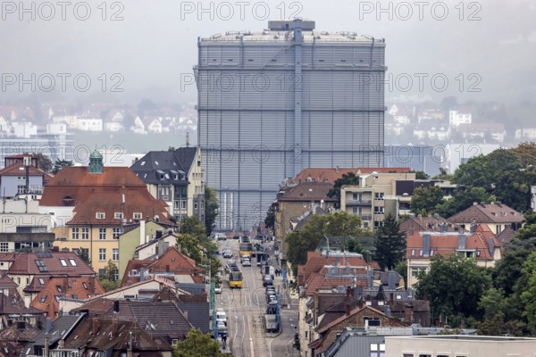 City view of Stuttgart. Hackstraße with gas boiler. and light rail vehicles of the SSB. Stuttgart, Baden-Württemberg, Germany