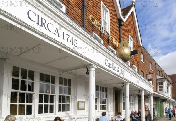 Frontage of historic building, Castle and Ball hotel public house, Marlborough, Wiltshire, England, UK