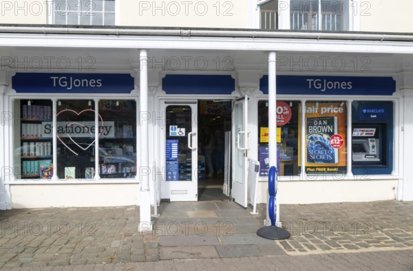 TG Jones shop signage rebranded WH Smith store, High Street, Marlborough, Wiltshire, England, UK