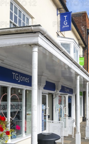 TG Jones shop signage rebranded WH Smith store, High Street, Marlborough, Wiltshire, England, UK