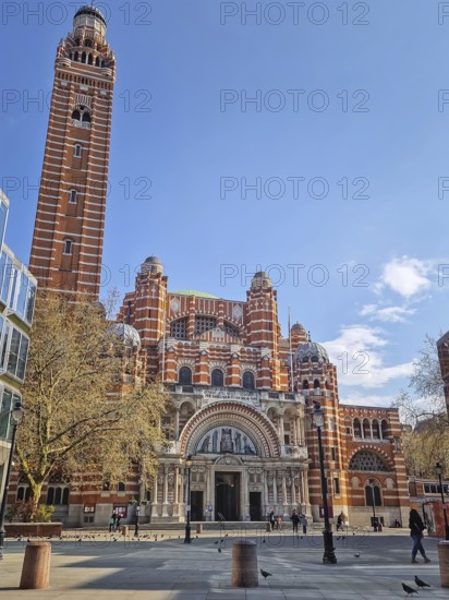 Westminster Cathedral, majestic Byzantine style, Roman Catholic cathedral built with striking red and white brickwork and a tall campanile. Prominent religious and architectural landmark in London, UK