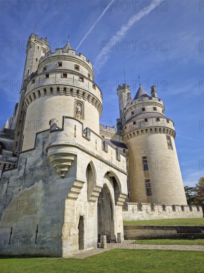 Chateau de Pierrefonds romanticized french medieval architecture with imposing towers and battlements, Oise, France