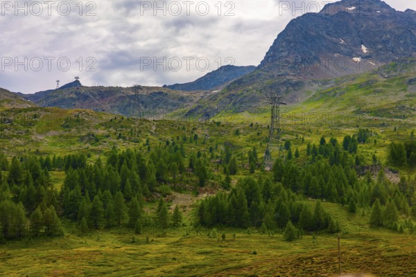 Overhead Cable Car with Mountain View in the Swiss Alps in a Sunny Summer Day in Bernina, Valposchiavo, Pontresina, Grisons, Switzerland