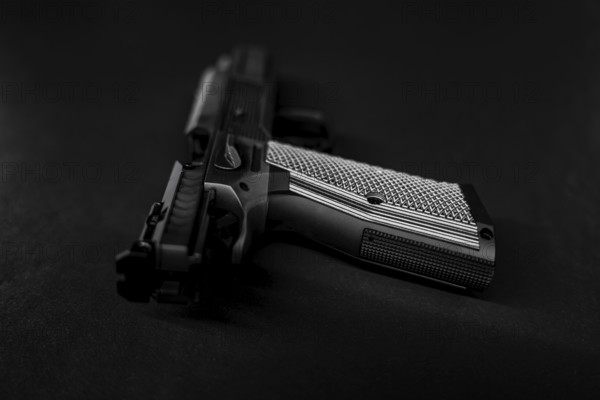 Modern Elegant Sport Handgun For IPDA on Grey Background in Switzerland