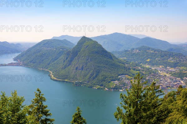 Panoramic View over Lake Lugano and Mountain View in the Swiss Alps and Cityscape in a Sunny Summer Day in Lugano, Ticino, Switzerland