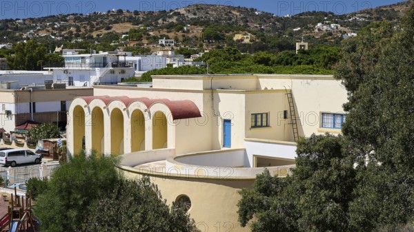 Primary school, Panorama of a Mediterranean building with arches and hills in the background, Historicism, Art Deco, Rationalism, Portolago, Lakki, Leros, Dodecanese, Greek Islands, Greece