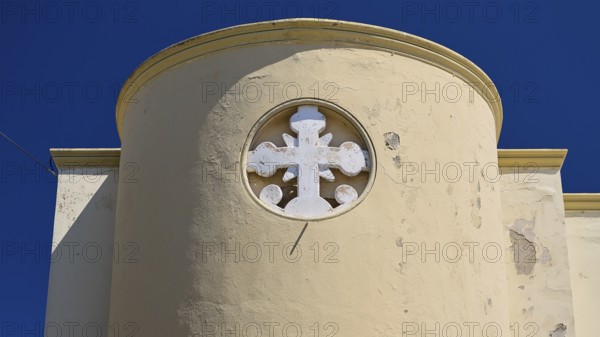 Primary school, Round tower with white cross on a beige wall under a clear sky, Historicism, Art Deco, Rationalism, Portolago, Lakki, Leros, Dodecanese, Greek Islands, Greece