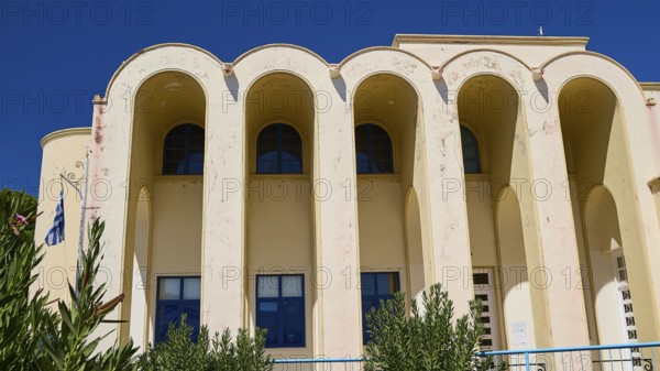 Primary school, Front view of a Mediterranean building with large arches, Historicism, Art Deco, Rationalism, Portolago, Lakki, Leros, Dodecanese, Greek Islands, Greece