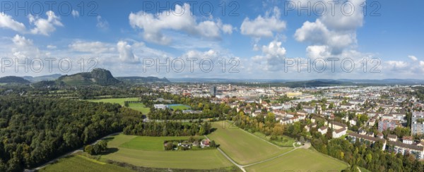 Aerial view, panorama of the town of Singen am Hohentwiel with the Münchriedstadion and Friedrich-Wöhler Gymnasium, on the horizon the Hegauberge, district of Constance, Baden-Württemberg, Germany