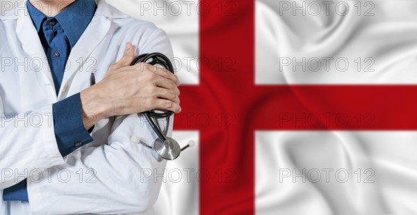 England healthcare concept. Doctor with stethoscope on England flag. Doctor holding stethoscope on English flag