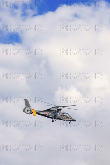 French marine helicopter flying on the sky, Crozon peninsula, Bretagne, France