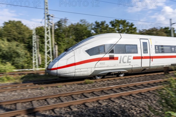 Train traffic on one of the busiest railway lines in Germany, ICE train between Duisburg and Düsseldorf, commuter trains, regional trains, ICE and IC long-distance trains and freight traffic, North Rhine-Westphalia, Germany