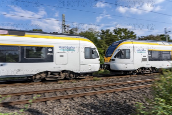 Train services on one of the busiest railway lines in Germany, regional services, RE3, Rhein-Emscher-Express, from Hamm via Dortmund, Gelsenkirchen and Duisburg to Düsseldorf, the Eurobahn, train between Duisburg and Düsseldorf, commuter trains, regional trains, ICE and IC long-distance services and freight services operate here, North Rhine-Westphalia, Germany