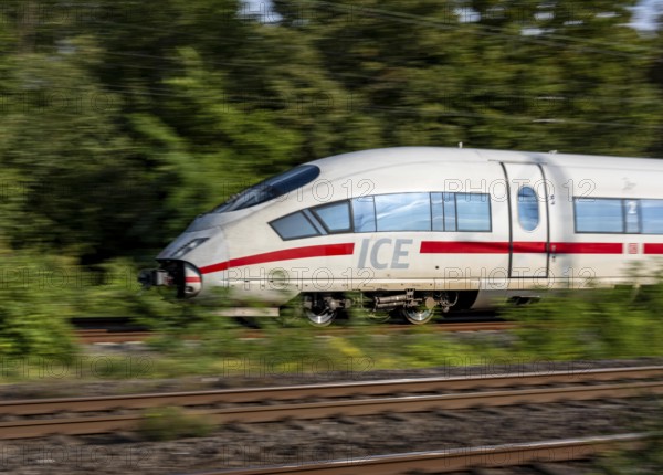 Train traffic on one of the busiest railway lines in Germany, ICE train between Duisburg and Düsseldorf, commuter trains, regional trains, ICE and IC long-distance trains and freight traffic, North Rhine-Westphalia, Germany