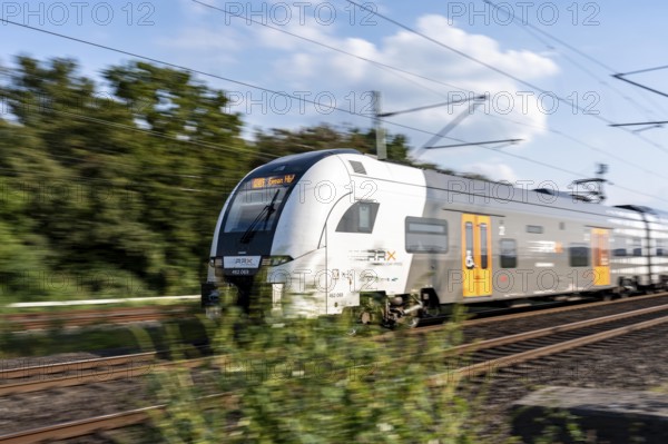 Train services on one of the busiest railway lines in Germany, regional services, RE6, RRX, Rhine-Ruhr Express, National Express, train between Duisburg and Düsseldorf, commuter trains, regional trains, ICE and IC long-distance services and freight transport, North Rhine-Westphalia, Germany