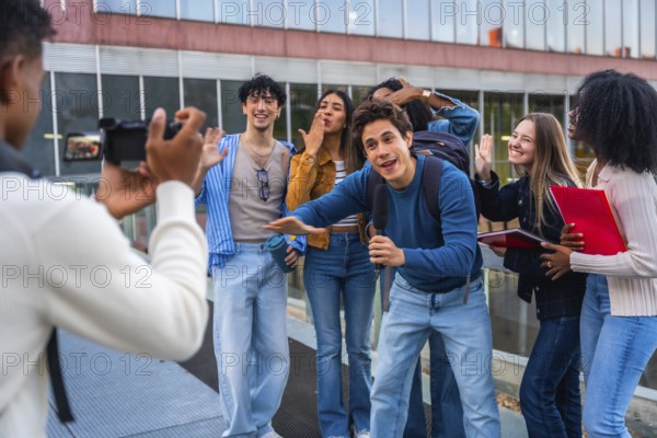 Group of happy diverse university students recording a video blog together with a camera, capturing energetic moments and sharing their college experience outdoors