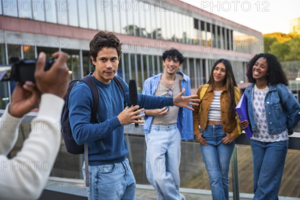 Young diverse students collaborating on a media project, a man holding a boom microphone interviewing peers while another person films on a university campus