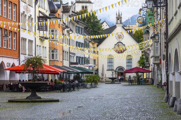 Market square, historic buildings, fountain, St John's Church, Feldkirch, Vorarlberg, Austria