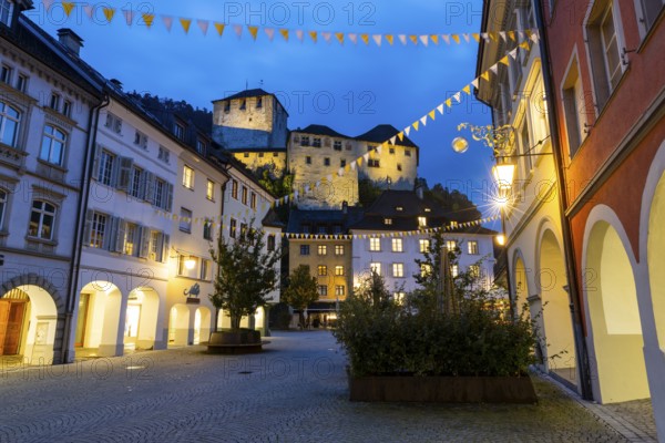 Historic houses, alley of houses with view of Schattenburg Castle, Blue Hour, Neustadt, Markokkanerstraße, Feldkirch, Vorarlberg, Austria