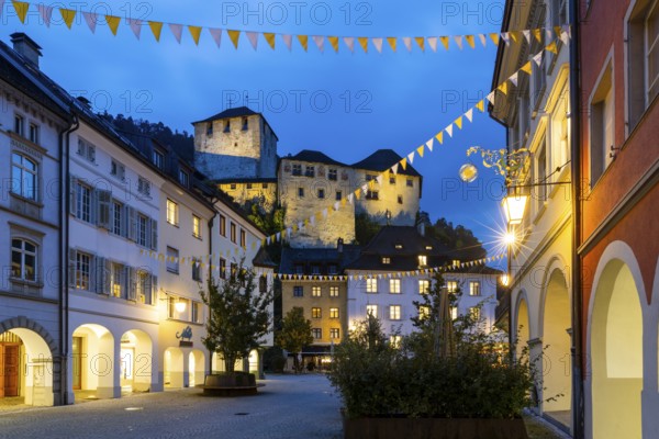 Historic houses, alley of houses with view of Schattenburg Castle, Blue Hour, Neustadt, Markokkanerstraße, Feldkirch, Vorarlberg, Austria