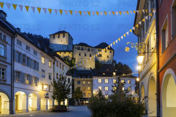 Historic houses, alley of houses with view of Schattenburg Castle, Blue Hour, Neustadt, Markokkanerstraße, Feldkirch, Vorarlberg, Austria