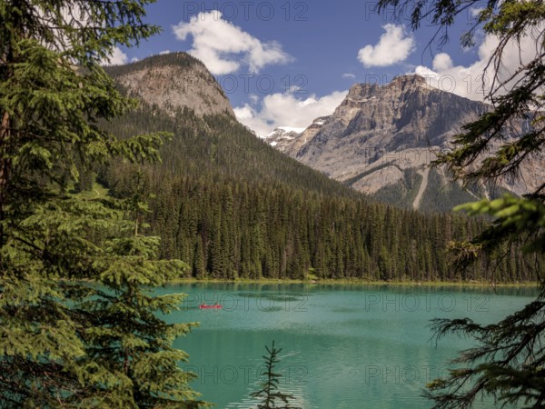 Kayak on Emerald Lake with the Canadian Rocky Mountains landscape within Yoho National Park in Alberta, Canada, North Canada