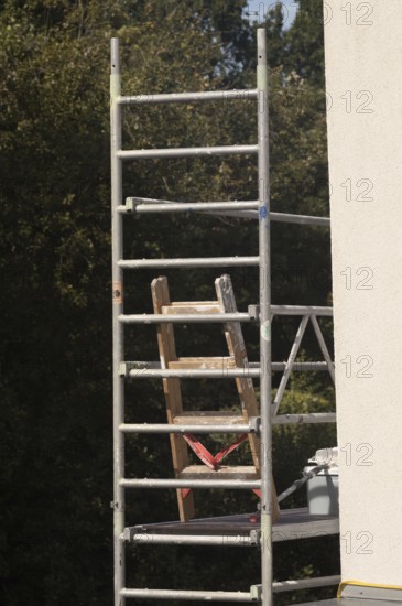 Borken, NRW, Germany, Scaffolding structure with ladder supporting outdoor construction and renovation work