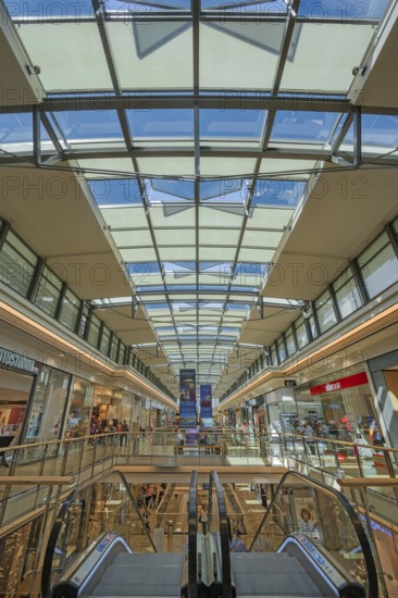 Shops, escalator and skylight in Forum Allgäu, Kempten, Allgäu, Swabia, Germany