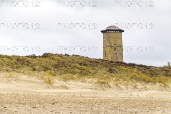 Coastal beach scenery at the North Sea including the water tower near Domburg in Walcheren in the dutch province of Zeeland