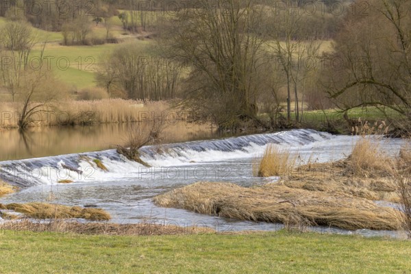 Rural impression at the Jagst river near a small village named Oberregenbach near Langenburg in Hohenlohe, a area in Southern Germany