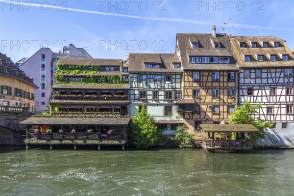 Idyllic waterside impression around a district named Petite France in Strasbourg, a city at the Alsace region in France